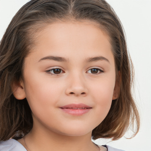 Joyful white child female with medium  brown hair and brown eyes