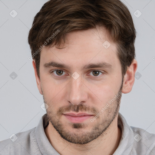 Neutral white young-adult male with short  brown hair and grey eyes