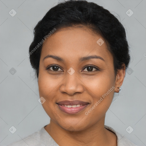 Joyful latino young-adult female with short  brown hair and brown eyes