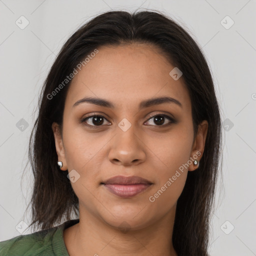 Joyful latino young-adult female with long  brown hair and brown eyes