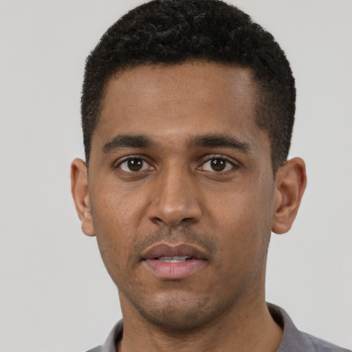Neutral black young-adult male with short  brown hair and brown eyes