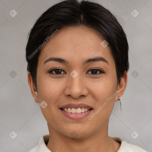 Joyful asian young-adult female with medium  brown hair and brown eyes