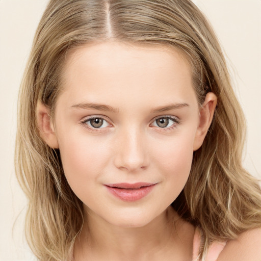 Joyful white child female with long  brown hair and brown eyes