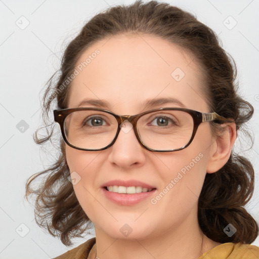 Joyful white young-adult female with medium  brown hair and blue eyes