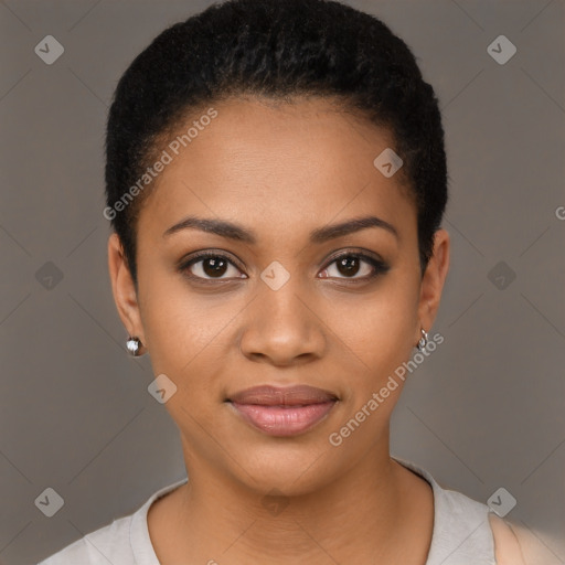 Joyful black young-adult female with short  black hair and brown eyes