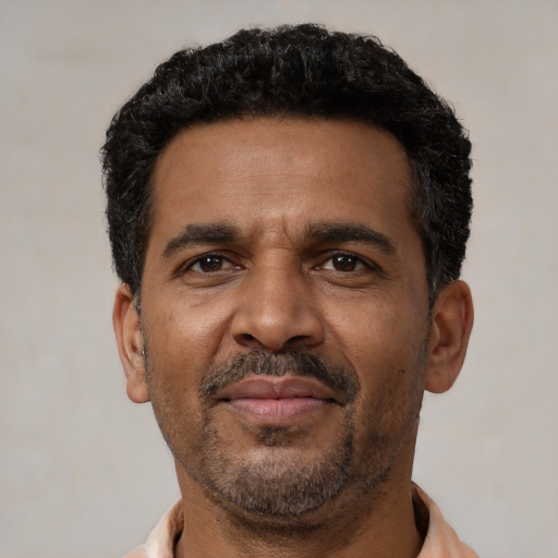 Neutral black adult male with short  black hair and brown eyes