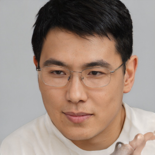 Neutral asian young-adult male with short  brown hair and brown eyes