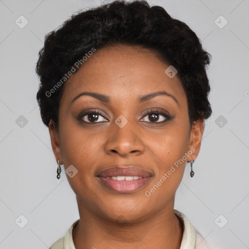 Joyful black young-adult female with short  black hair and brown eyes