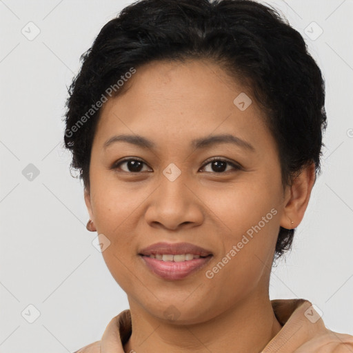 Joyful latino young-adult female with short  brown hair and brown eyes