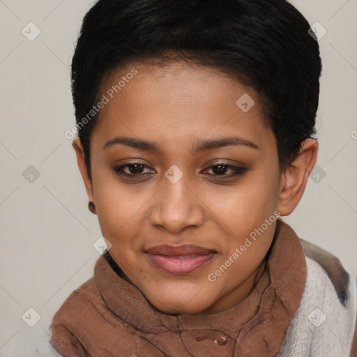 Joyful black young-adult female with short  brown hair and brown eyes