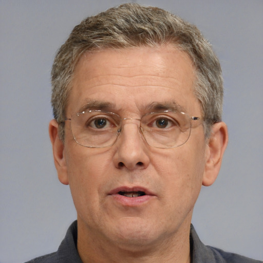 Neutral white middle-aged male with short  brown hair and brown eyes