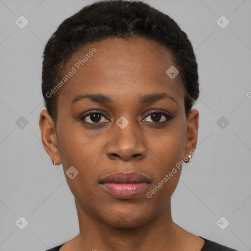 Joyful black young-adult female with short  brown hair and brown eyes