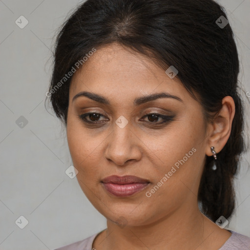 Joyful latino young-adult female with medium  brown hair and brown eyes