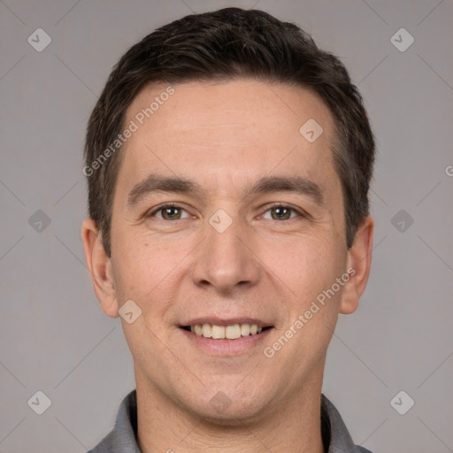 Joyful white adult male with short  brown hair and brown eyes