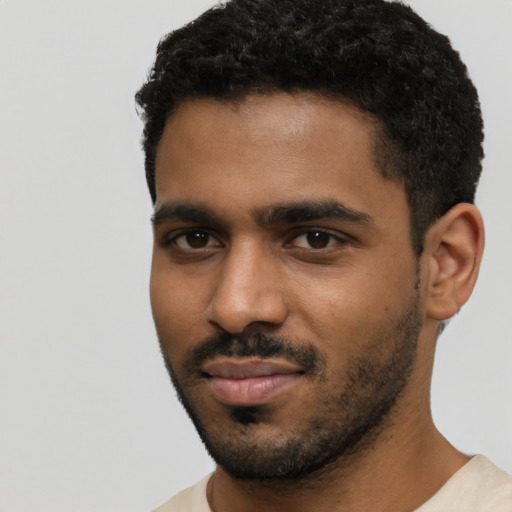 Neutral black young-adult male with short  black hair and brown eyes
