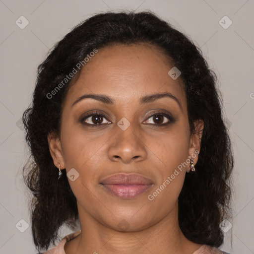 Joyful black young-adult female with medium  brown hair and brown eyes