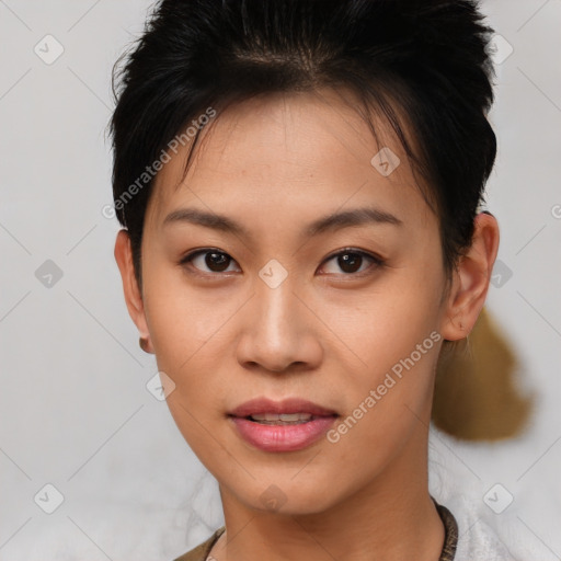 Joyful asian young-adult female with short  brown hair and brown eyes