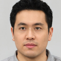 Neutral asian young-adult male with short  black hair and brown eyes