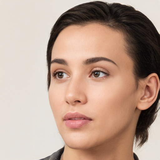 Neutral white young-adult female with medium  brown hair and brown eyes