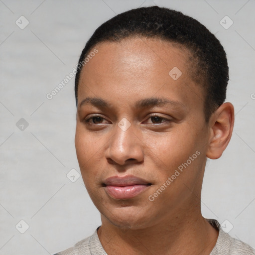 Joyful black young-adult female with short  brown hair and brown eyes