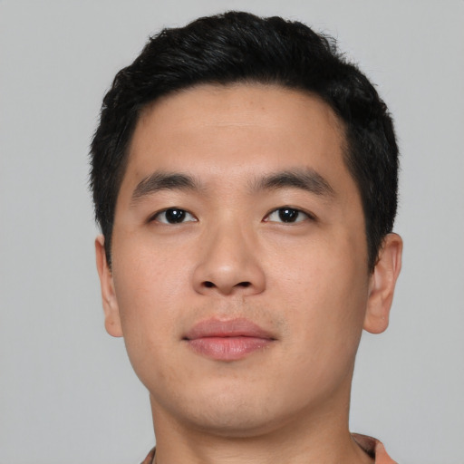 Neutral asian young-adult male with short  black hair and brown eyes