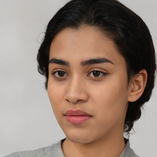 Neutral asian young-adult female with medium  black hair and brown eyes