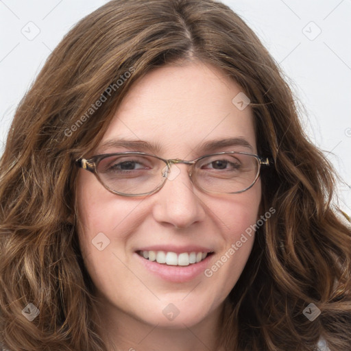 Joyful white young-adult female with long  brown hair and blue eyes