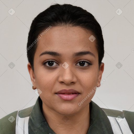 Joyful latino young-adult female with short  black hair and brown eyes