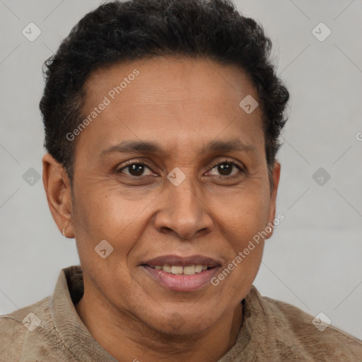 Joyful black adult male with short  brown hair and brown eyes