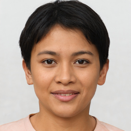 Joyful asian young-adult female with short  brown hair and brown eyes