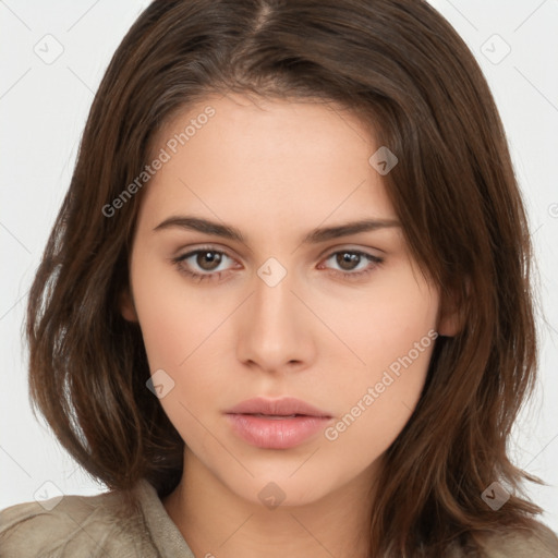 Neutral white young-adult female with long  brown hair and brown eyes