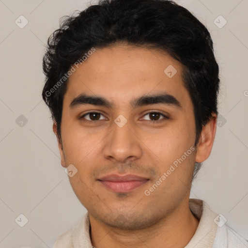 Joyful latino young-adult male with short  black hair and brown eyes