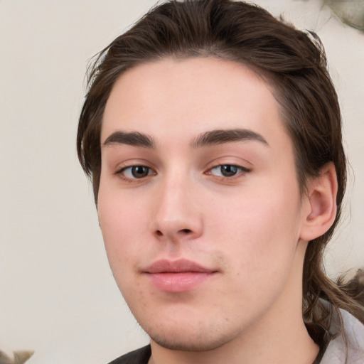 Neutral white young-adult male with medium  brown hair and grey eyes