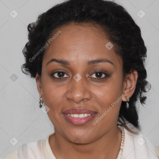 Joyful black young-adult female with medium  brown hair and brown eyes