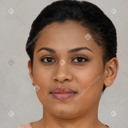 Joyful black young-adult female with short  brown hair and brown eyes