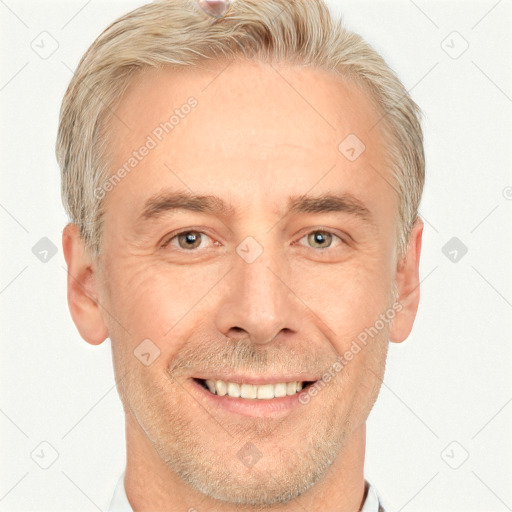 Joyful white adult male with short  brown hair and grey eyes