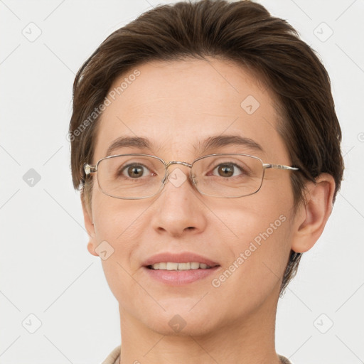 Joyful white adult female with short  brown hair and brown eyes