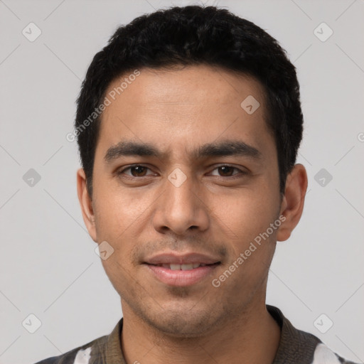 Joyful white young-adult male with short  black hair and brown eyes