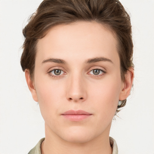 Neutral white young-adult female with short  brown hair and brown eyes