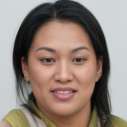 Joyful white young-adult female with medium  brown hair and brown eyes