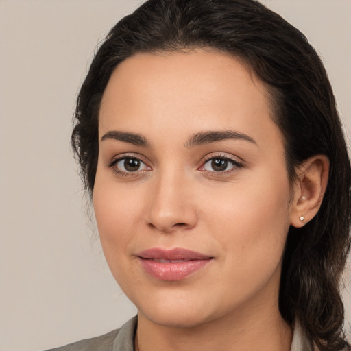 Joyful white young-adult female with medium  brown hair and brown eyes