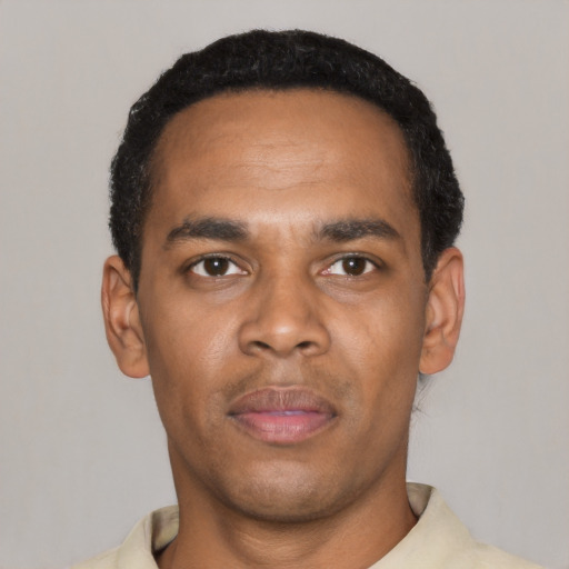 Neutral black young-adult male with short  black hair and brown eyes