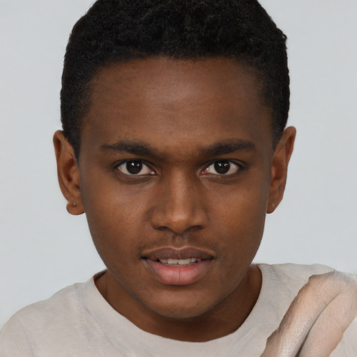 Neutral black young-adult male with short  brown hair and brown eyes