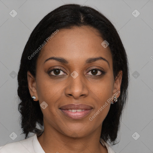Joyful black young-adult female with medium  brown hair and brown eyes