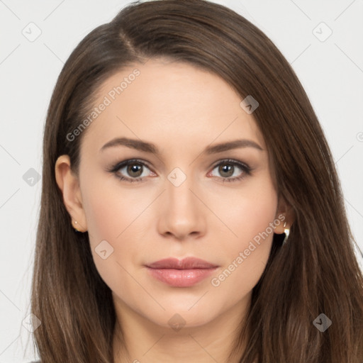 Neutral white young-adult female with long  brown hair and brown eyes