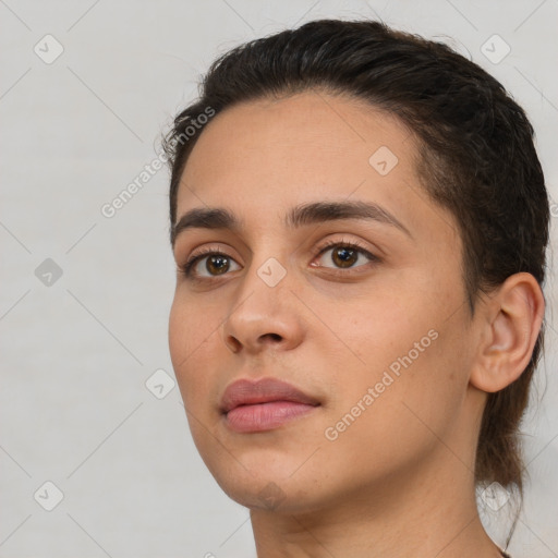 Neutral white young-adult female with short  brown hair and brown eyes