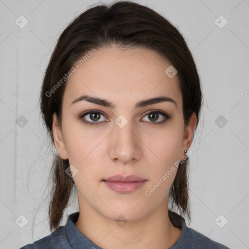 Neutral white young-adult female with medium  brown hair and brown eyes