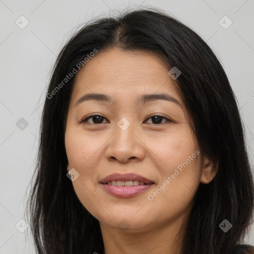 Joyful asian young-adult female with long  brown hair and brown eyes