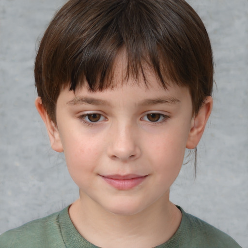 Joyful white child female with short  brown hair and brown eyes