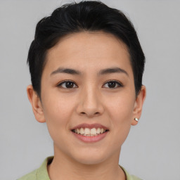 Joyful asian young-adult female with short  brown hair and brown eyes